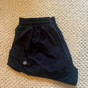 Black Lululemon 2.5” Hotty Hot Shorts.